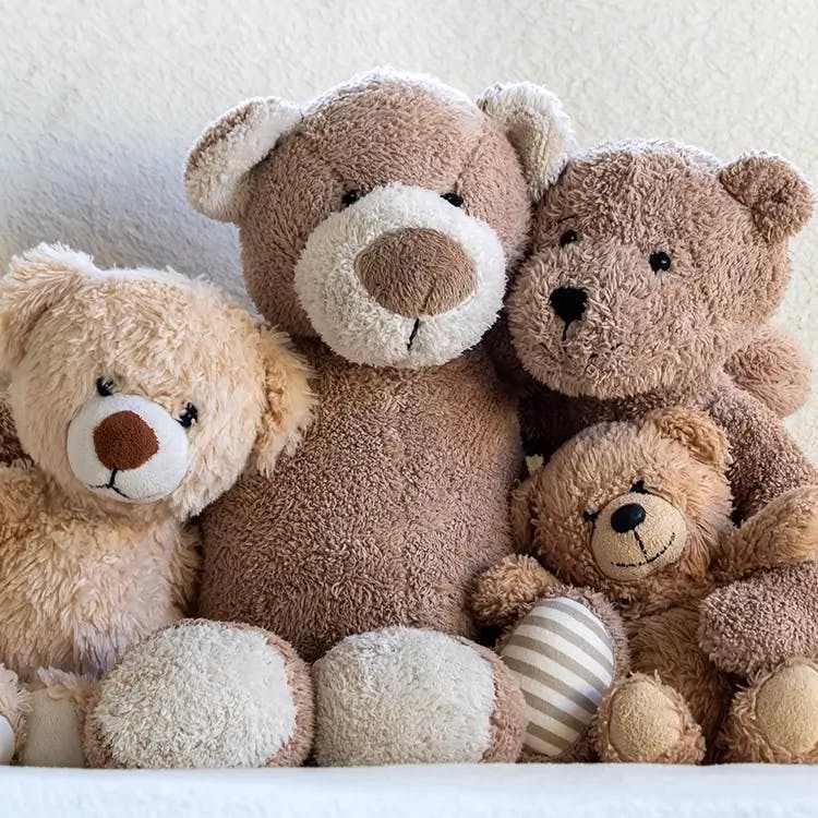 Four plush teddy bears