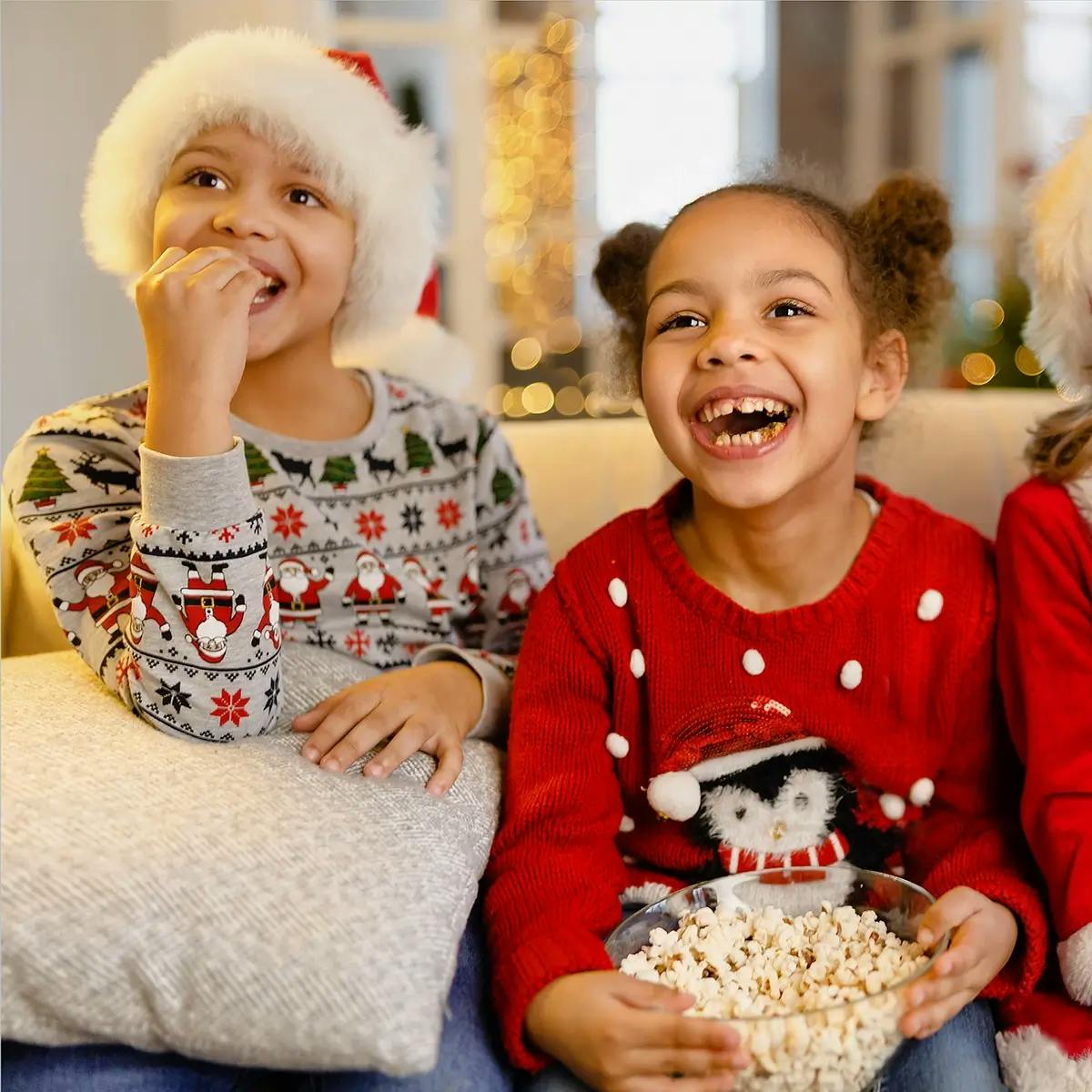 Children watching a Christmas in July movie