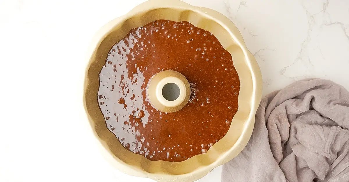 Vegan Chocolate Orange Cake batter in a bundt tin, ready to go into the oven.