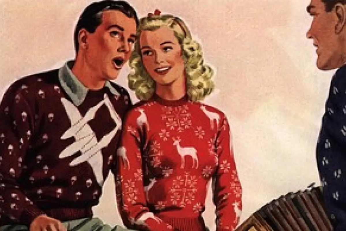 Man and woman in 1950s advertisement, wearing the first Christmas sweaters.