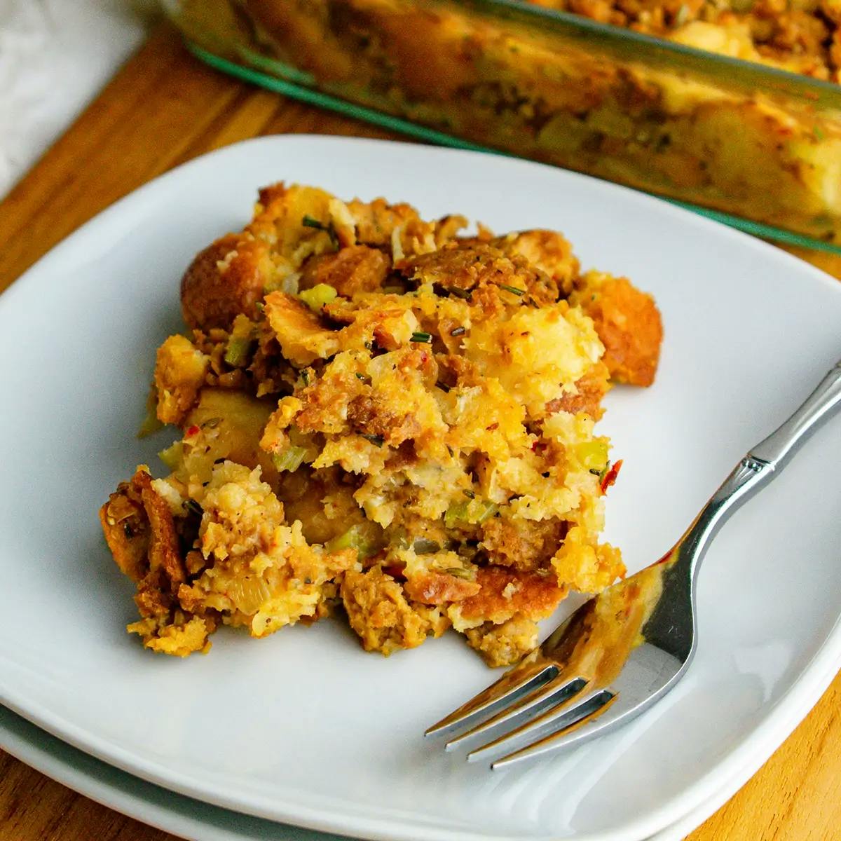 A portion of vegan stuffing on a plate.