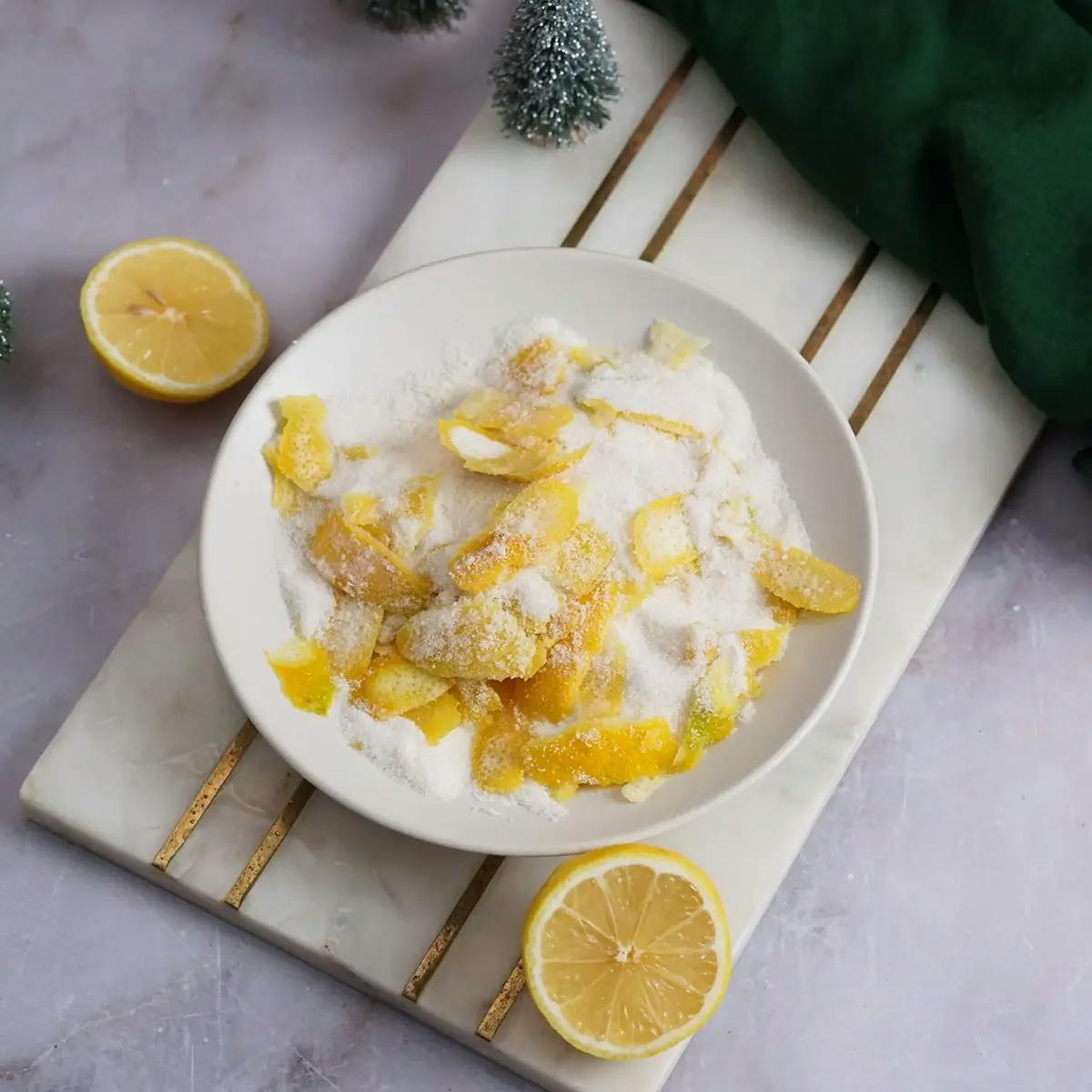Lemons and sugar in a bowl.