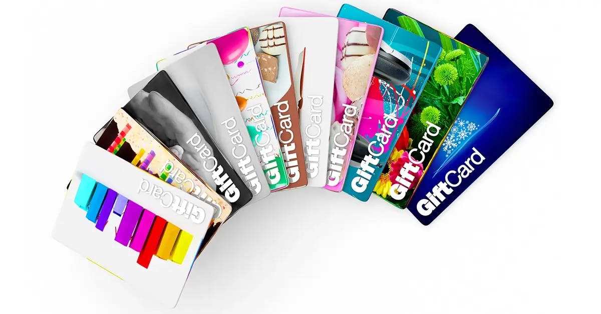 Fanned out gift cards in multiple colors.