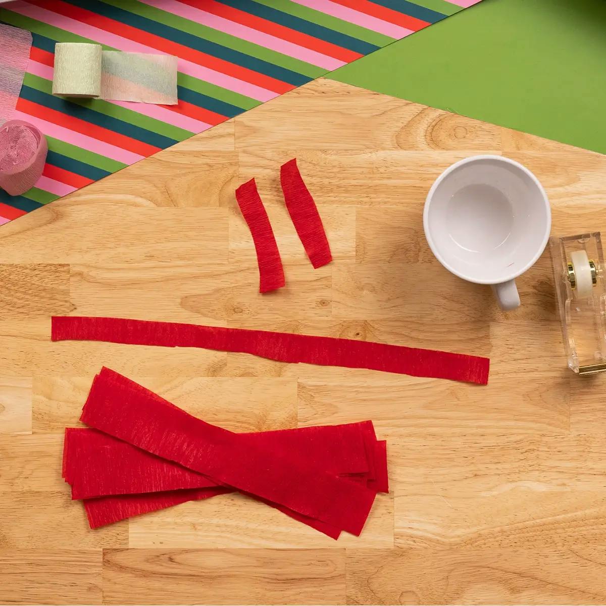 All the crepe paper strips needed to wrap a mug as a holiday gift.