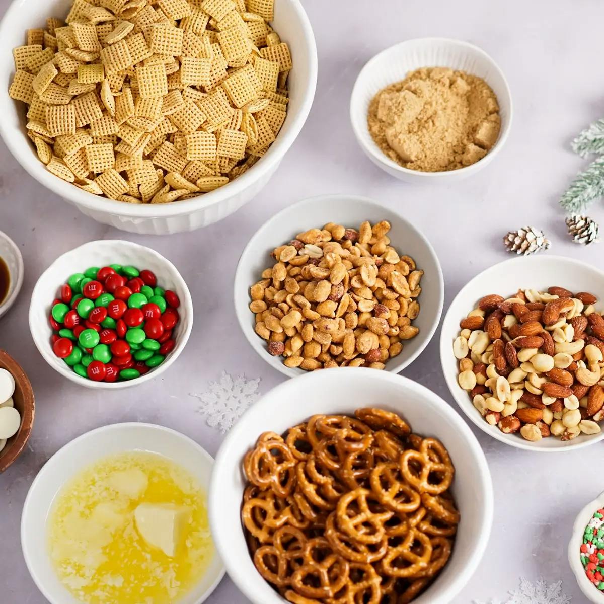 Ingredients for a homemade chex mix recipe for Christmas.