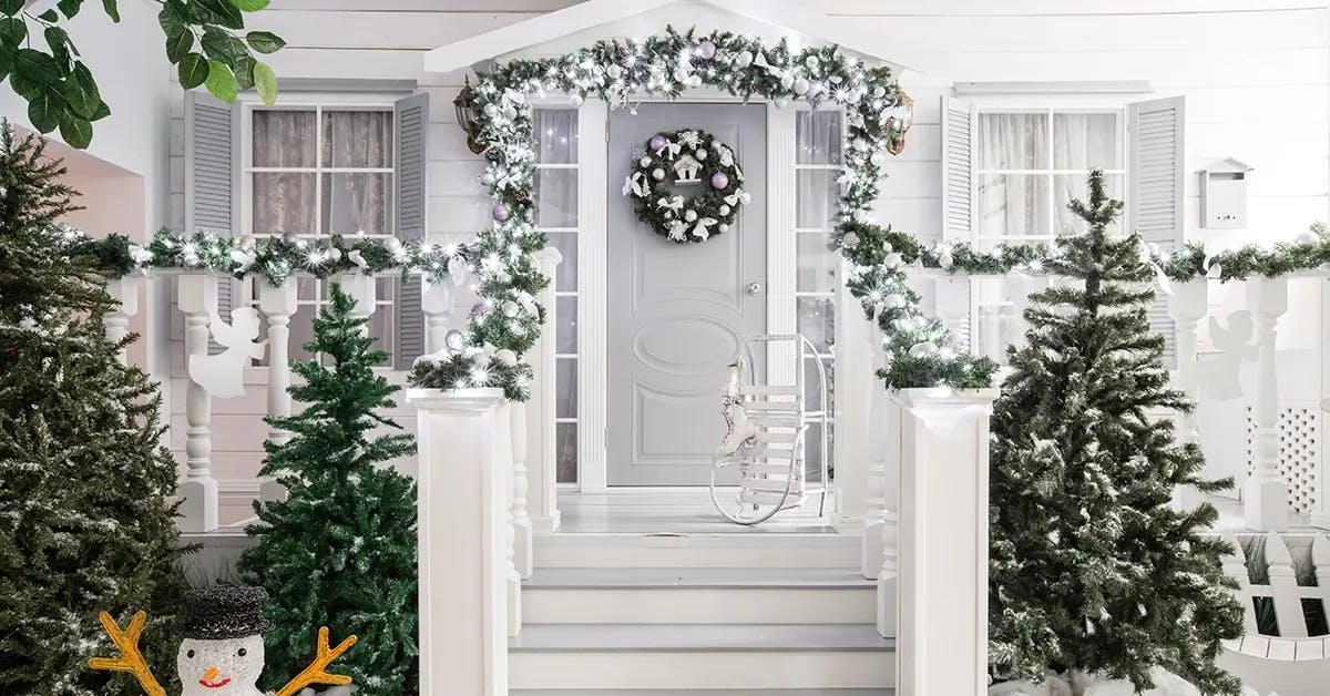White front door Christmas decorations.