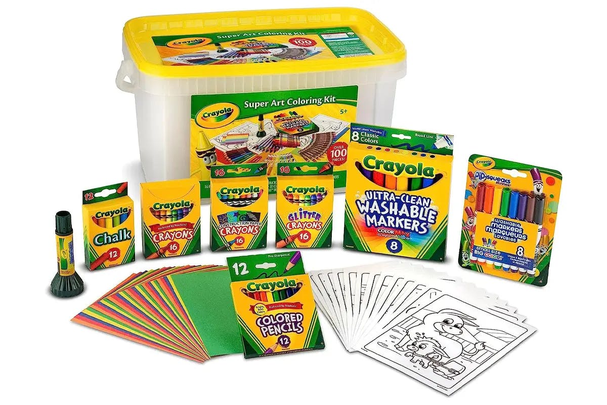A crayon activity set with multiple boxes of crayons, glitter crayons, construction paper, colored chalk and colored pencils.